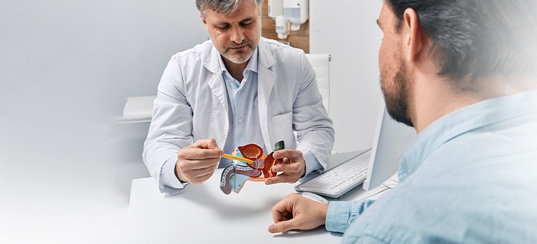  Urologist and patient in consultation.