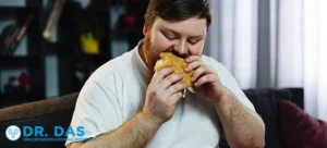 Guy eating burger