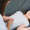 Doctor examining child