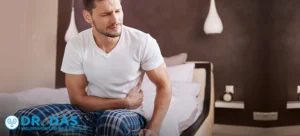 Man holding stomach