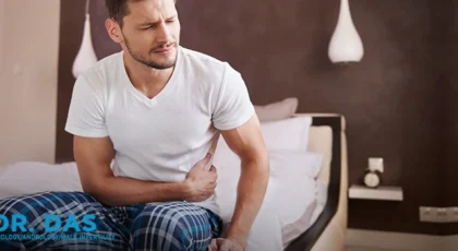 Man holding stomach